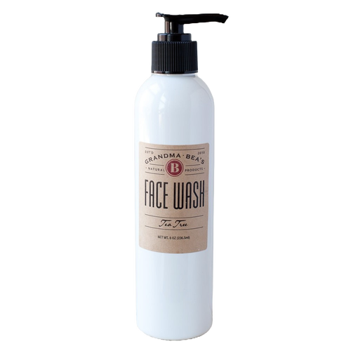 White 8-ounce pump bottle of all-natural tea tree face wash with a simple tan label, handcrafted in the USA, featured in Health & Wellness and Grooming collections.