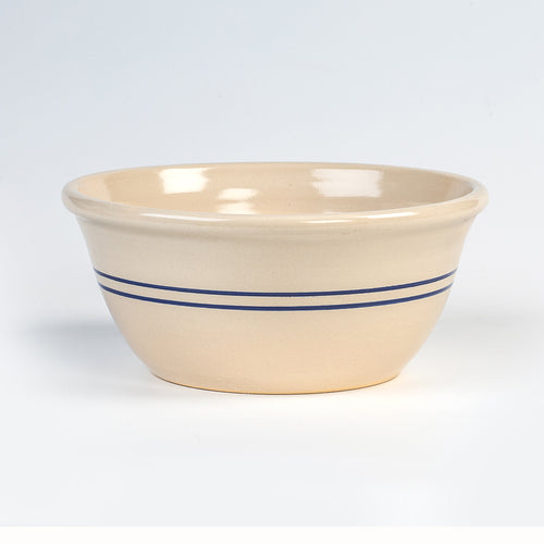 Handcrafted stoneware bowl with two dark blue stripes on a creamy beige background, made in the USA, perfect for Kitchen & Food, Cookware, and Baking Supplies collections.