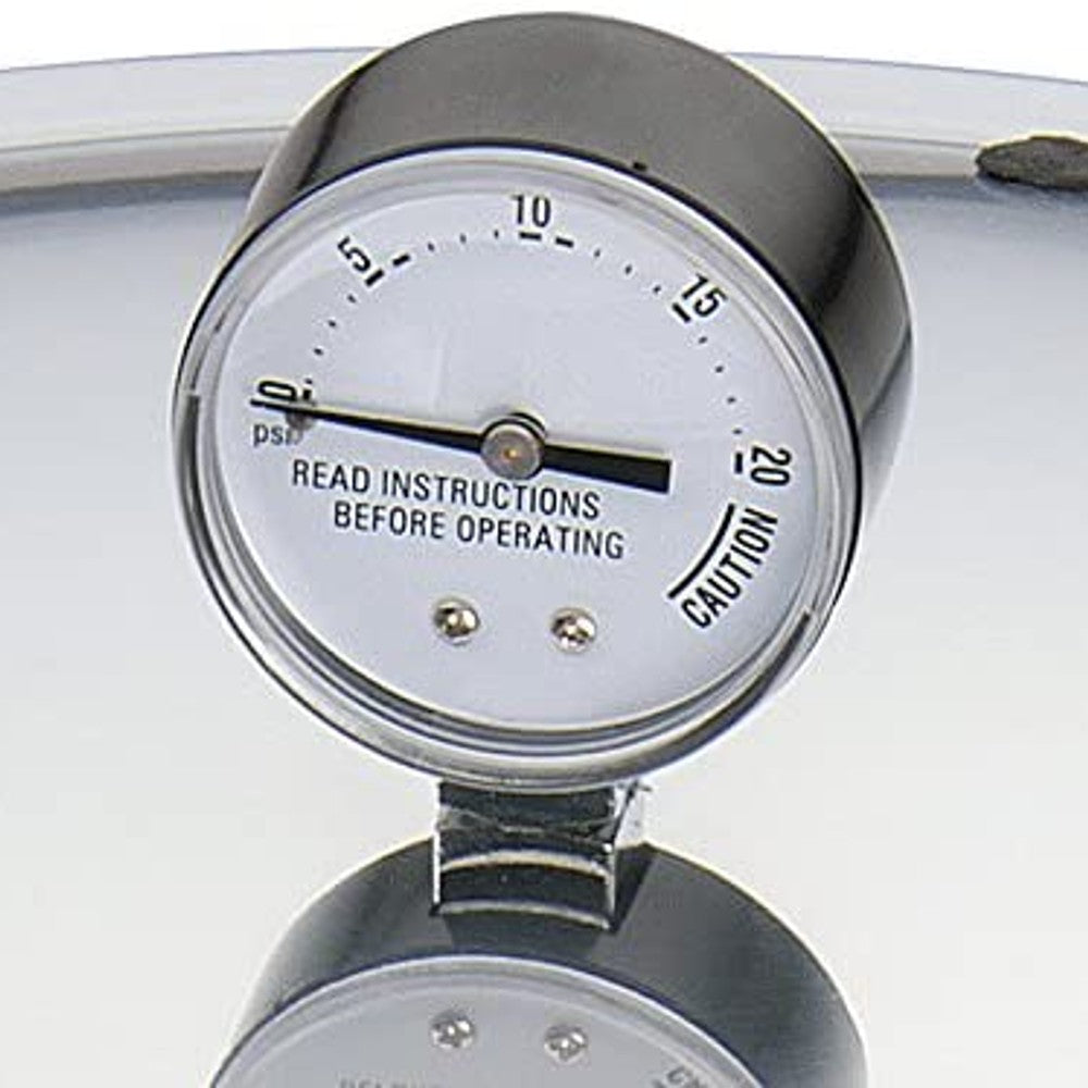 Close-up of a pressure gauge with clear markings and safety warning, designed for accurate monitoring in home food preservation and pressure canning collections.