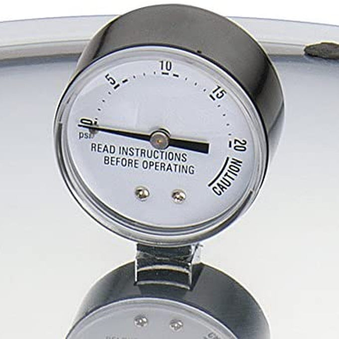 Close-up of a pressure gauge with clear markings and safety warning, designed for accurate monitoring in home food preservation and pressure canning collections.