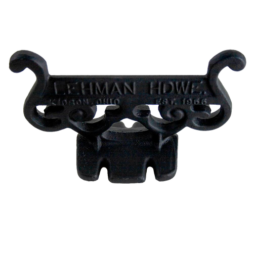 Handcrafted glossy black cast aluminum boot scraper with vintage scroll design, Amish made in USA, durable and rustproof, ideal for Home & Decor and Household Helpers collections.