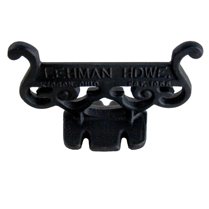Handcrafted glossy black cast aluminum boot scraper with vintage scroll design, Amish made in USA, durable and rustproof, ideal for Home & Decor and Household Helpers collections.