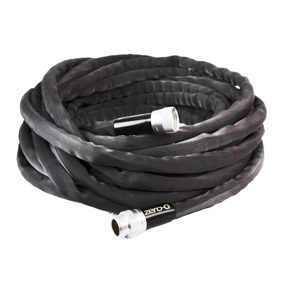 Coiled flexible black garden hose with silver crush-proof couplings, designed for easy handling and storage, featured in Farm, Garden & Tool and USA Made collections.