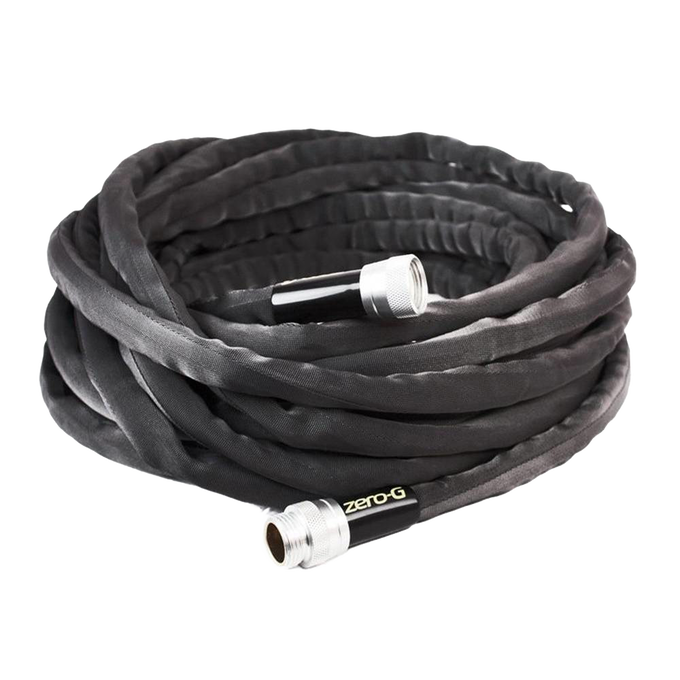 Coiled flexible black garden hose with silver crush-proof couplings, designed for easy handling and storage, featured in Farm, Garden & Tool and USA Made collections.