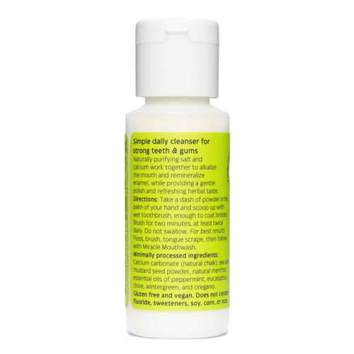 White plastic bottle of natural tooth powder with bright green label detailing ingredients and usage instructions, featured in Health & Wellness, Grooming, and USA Made collections.