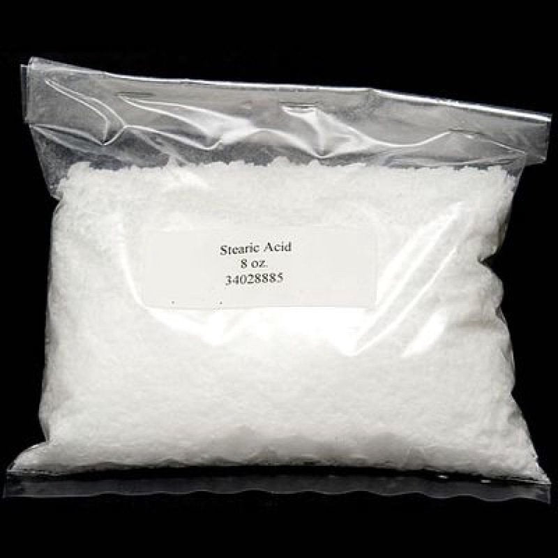 Clear resealable plastic bag containing 8 ounces of white stearic acid flakes used to strengthen and improve quality in candle making, featured in candles and soapmaking supplies.