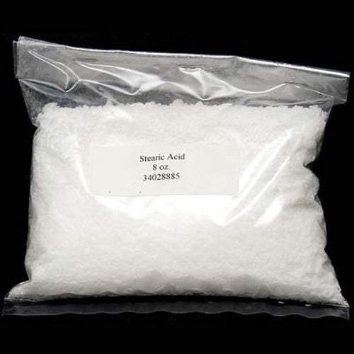 Clear resealable plastic bag containing 8 ounces of white stearic acid flakes used to strengthen and improve quality in candle making, featured in candles and soapmaking supplies.