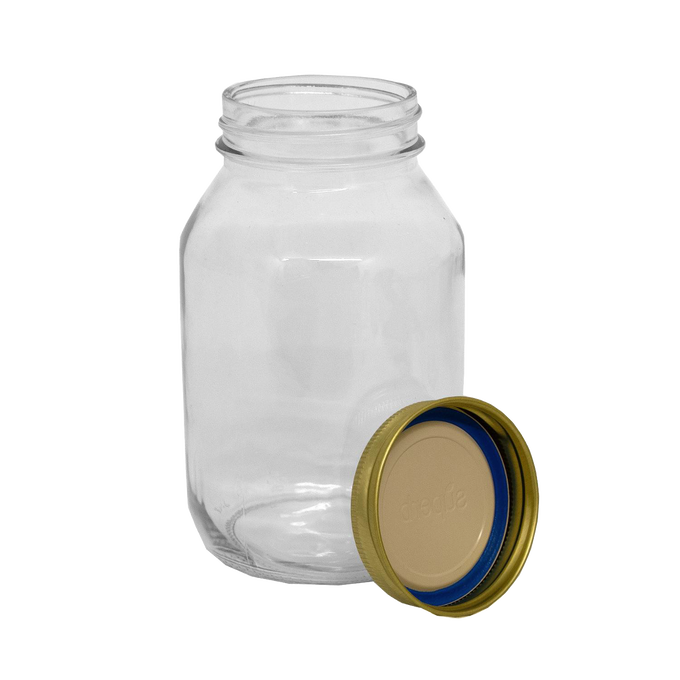 Clear durable regular-mouth glass jar paired with a metal lid featuring a blue sealing ring, made in USA for reliable food preservation in Kitchen & Food, Canning, and Best Sellers collections.