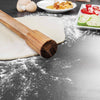 Handcrafted acacia wood rolling pin with fixed handles resting on rolled dough dusted with flour, surrounded by ingredients for baking, ideal for Kitchen & Food, Cookware, Baking Supplies, Best Sellers, and Promo Eligible collections.