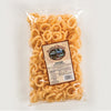 Clear plastic bag filled with crunchy onion flavored rings snack, featuring a label with rustic country design, part of USA made best sellers in Kitchen & Food collections.