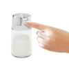 Hand pressing the stainless steel flip-top lid of a clear glass sugar dispenser designed to keep sugar dry and clump-free, perfect for Kitchen & Food, Kitchen Gadgets, and Storage collections.
