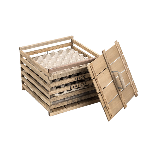 Handcrafted wooden egg crate with a slatted design and removable lid, ideal for safely carrying eggs on the farm or as a rustic barn accessory in animal care and chicken collections.
