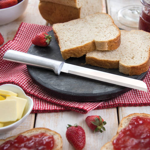 Handcrafted serrated bread knife with a sharp blade and stainless steel handle, perfect for slicing bread gently; part of USA Made, Kitchen Knives, and Food Prep collections.