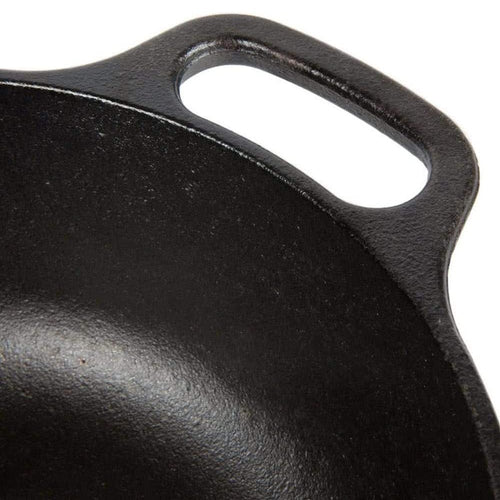 Close-up of the sturdy handle on a handcrafted cast iron cookware piece, made in USA for durable use in Kitchen & Food, Cookware, Cast Iron, Best Sellers, and Promo Eligible collections.