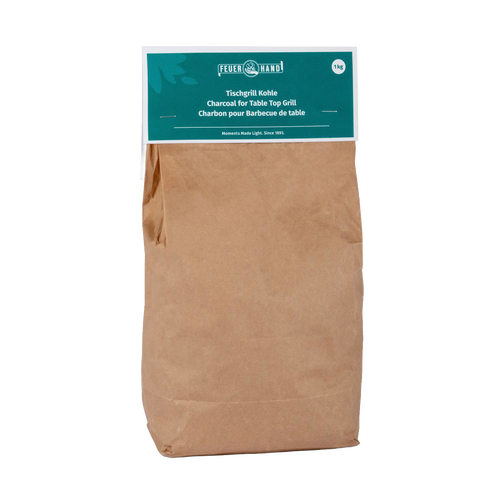 Brown paper bag containing high-quality charcoal designed for tabletop grills, featuring a green label with product details, ideal for grilling in Stoves, Grilling, Best Sellers, and Promo Eligible collections.