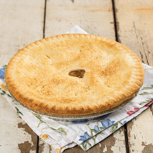 Homemade golden brown peach pie with a flaky crust in a foil pan, handcrafted in USA Amish Country, featured in Kitchen & Food, Snacks and Sweets, Pantry, and Best Sellers collections.