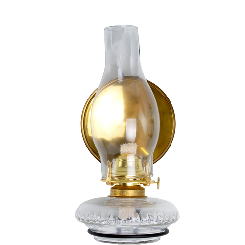 Clear glass oil lamp with a polished solid brass reflector behind the chimney, designed to enhance light projection, crafted in USA and part of lamps, oil lamps, and best sellers collections.