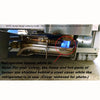 Lit burner inside the gas compartment of a US-made Diamond Designer 10 cu ft refrigerator, highlighting safety features and steel shielding during operation.