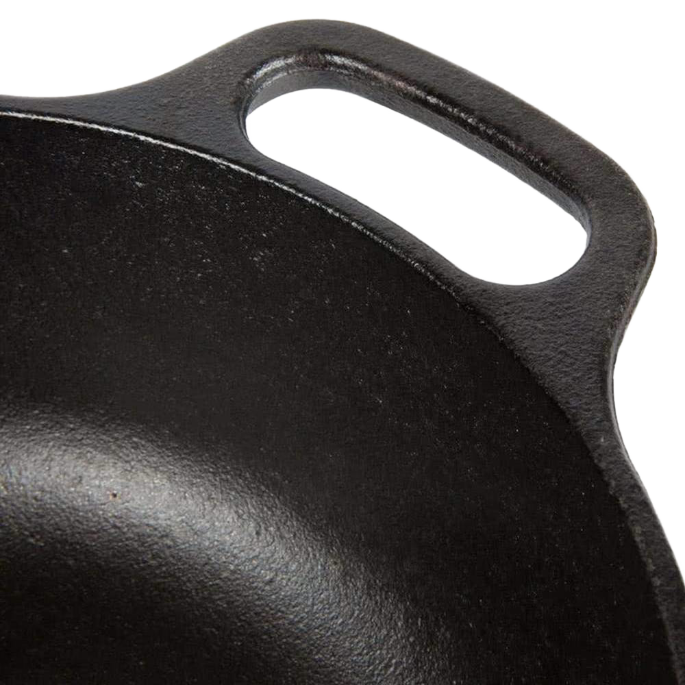 Close-up of the handle on a handcrafted black cast iron cookware piece, designed for durability and heat retention; ideal for Kitchen & Food, Cast Iron, Cookware, USA Made, Best Sellers, and Promo Eligible collections.