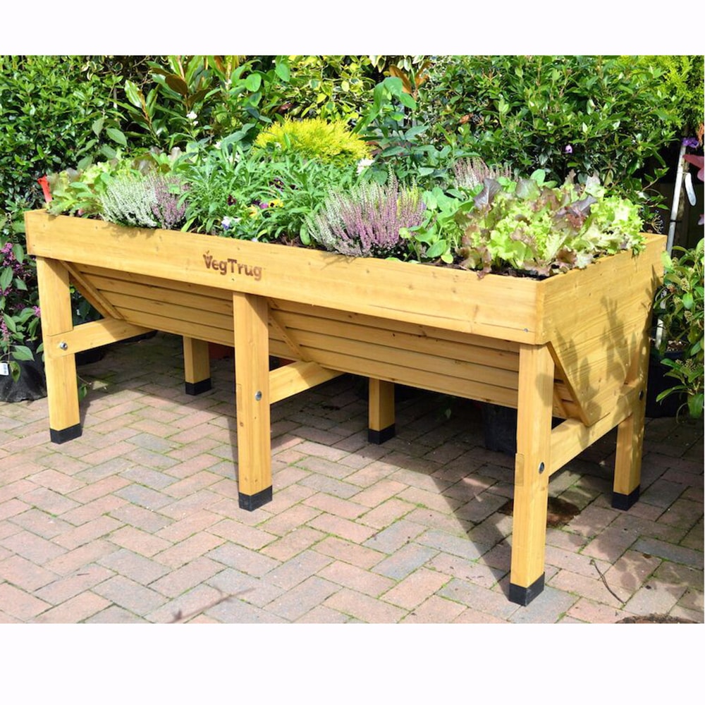 Handcrafted elevated wooden garden bed in natural finish growing a variety of vegetables and herbs, designed for easy planting without bending, featured in Farm, Garden & Tool, Garden Accessories, Seeds and Planting, Best Sellers, and Promo Eligible collections.