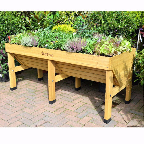 Handcrafted elevated wooden garden bed in natural finish growing a variety of vegetables and herbs, designed for easy planting without bending, featured in Farm, Garden & Tool, Garden Accessories, Seeds and Planting, Best Sellers, and Promo Eligible collections.