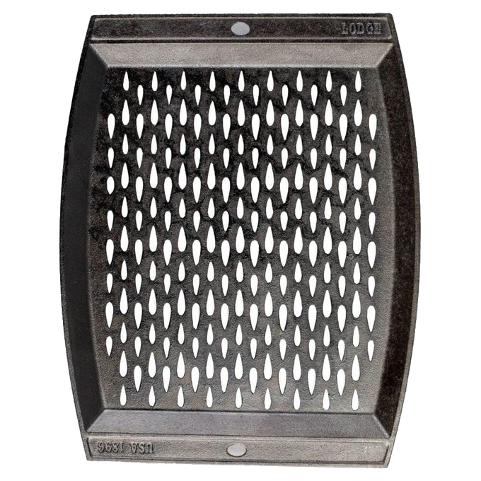 Handcrafted cast iron grill topper pan with signature teardrop perforations for enhanced grilling flavor, made in USA, featured in Kitchen & Food, Cast Iron, and Cookware collections.