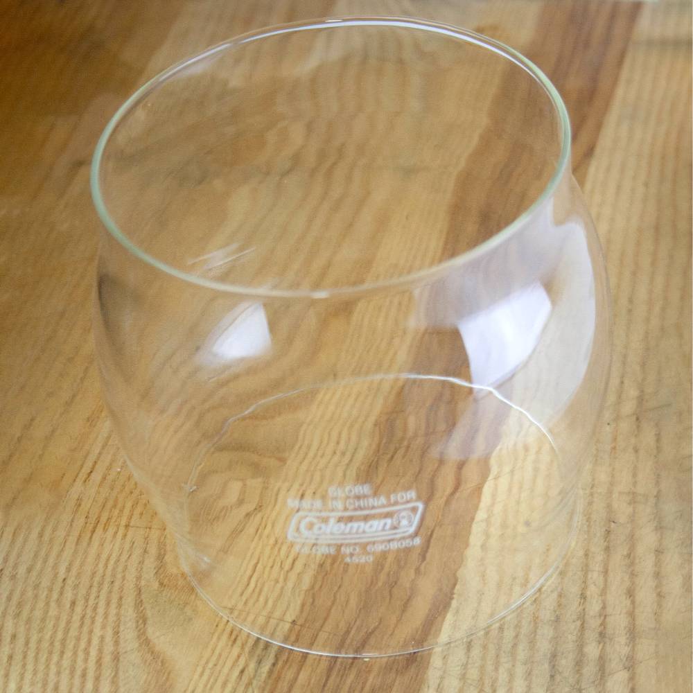 Clear replacement glass globe compatible with kerosene lanterns, designed for use in lamps and gas lights; ideal for emergency supplies and best sellers collections.
