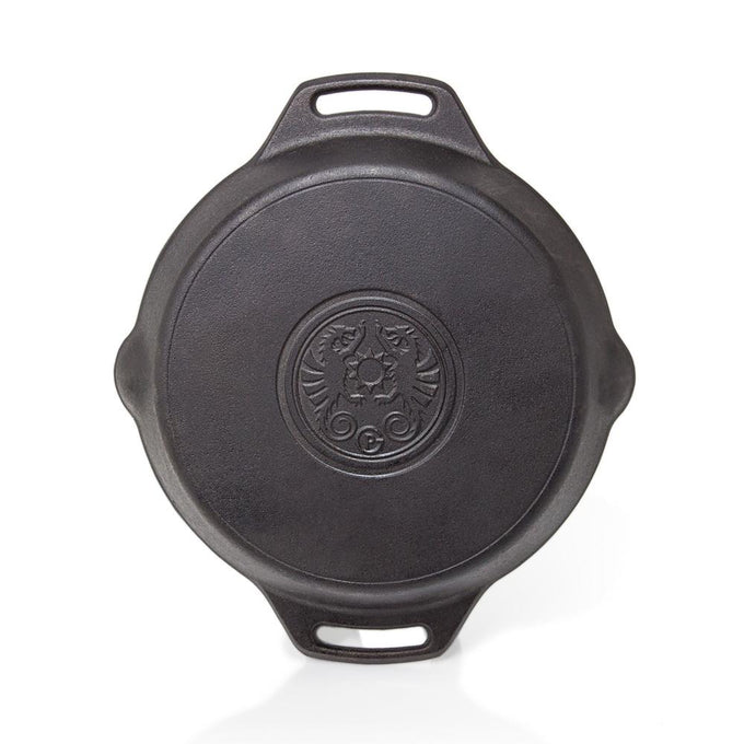 Top view of a durable cast iron skillet with two elongated handles and embossed emblem, handcrafted for versatile use in farm, garden, kitchen, camping, cookware, and cast iron collections.