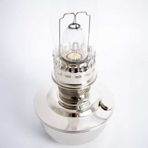 Handcrafted chrome-plated oil lamp featuring a clear glass chimney and detailed burner, ideal for Farm, Garden & Tool, Lamps & Lighting, Emergency Supplies, and Best Sellers collections.