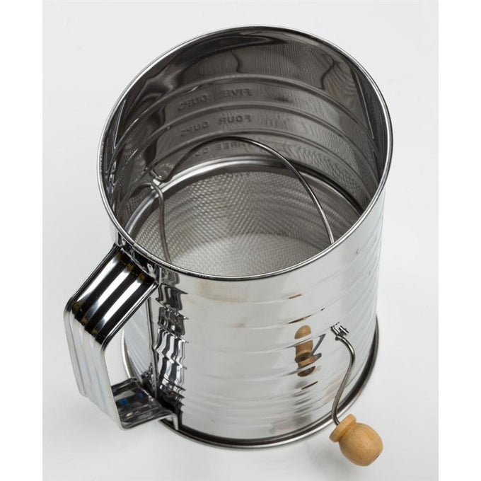 Shiny stainless steel flour sifter with a wooden handle and mesh screen, designed for clump-free baking, ideal for Kitchen & Food, Baking Supplies, and Cookware collections.