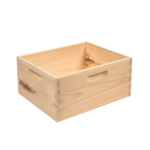 Handcrafted wooden bee box with smooth natural finish, assembled with dovetail joints and built-in handles, made in USA, ideal for beekeeping and farm supplies.