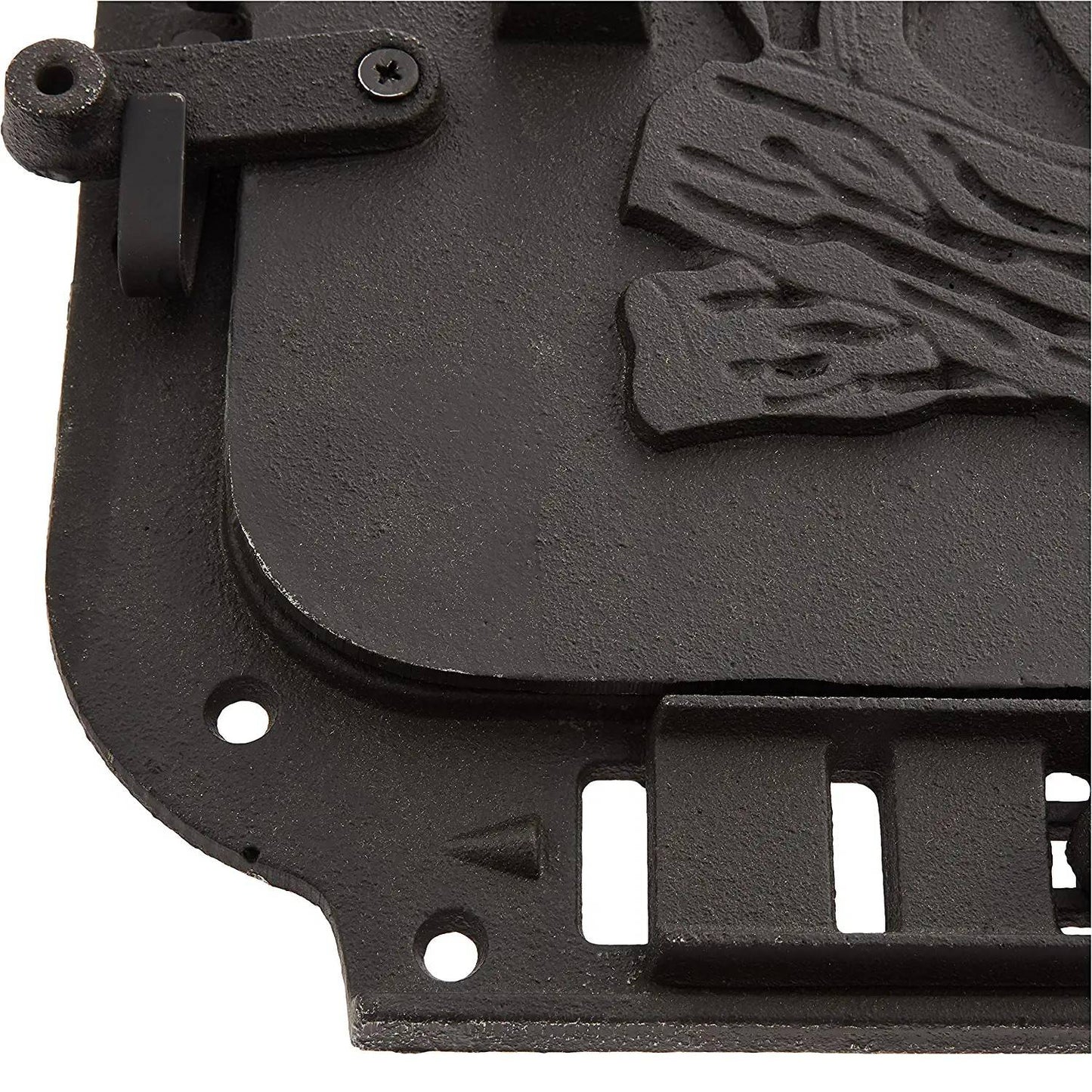 Close-up of a handcrafted cast iron stove door with embossed log design, featuring mounting holes and latch components, ideal for heatstoves and hearth accessories collections.