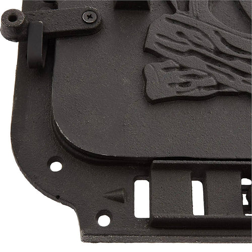 Close-up of a handcrafted cast iron stove door with embossed log design, featuring mounting holes and latch components, ideal for heatstoves and hearth accessories collections.