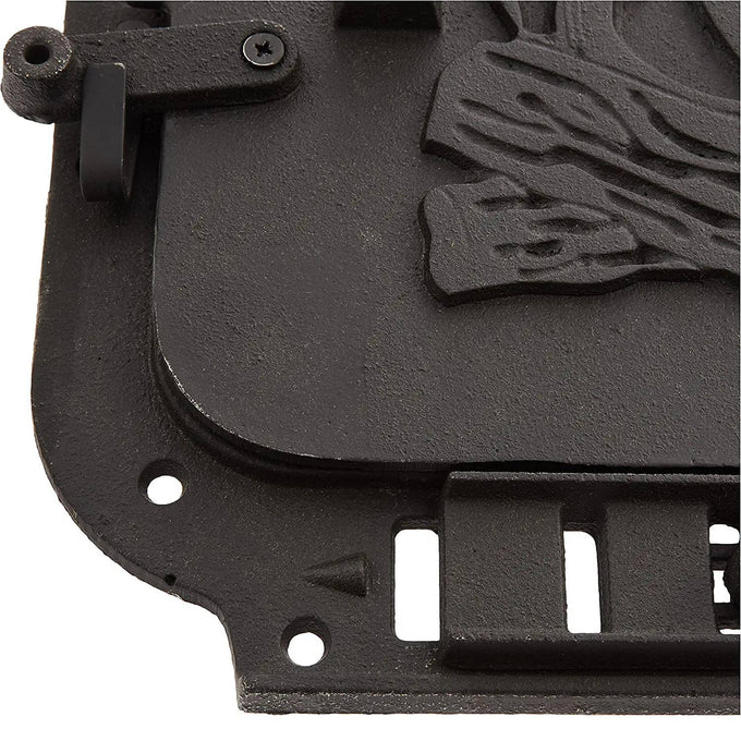 Close-up of a handcrafted cast iron stove door with embossed log design, featuring mounting holes and latch components, ideal for heatstoves and hearth accessories collections.