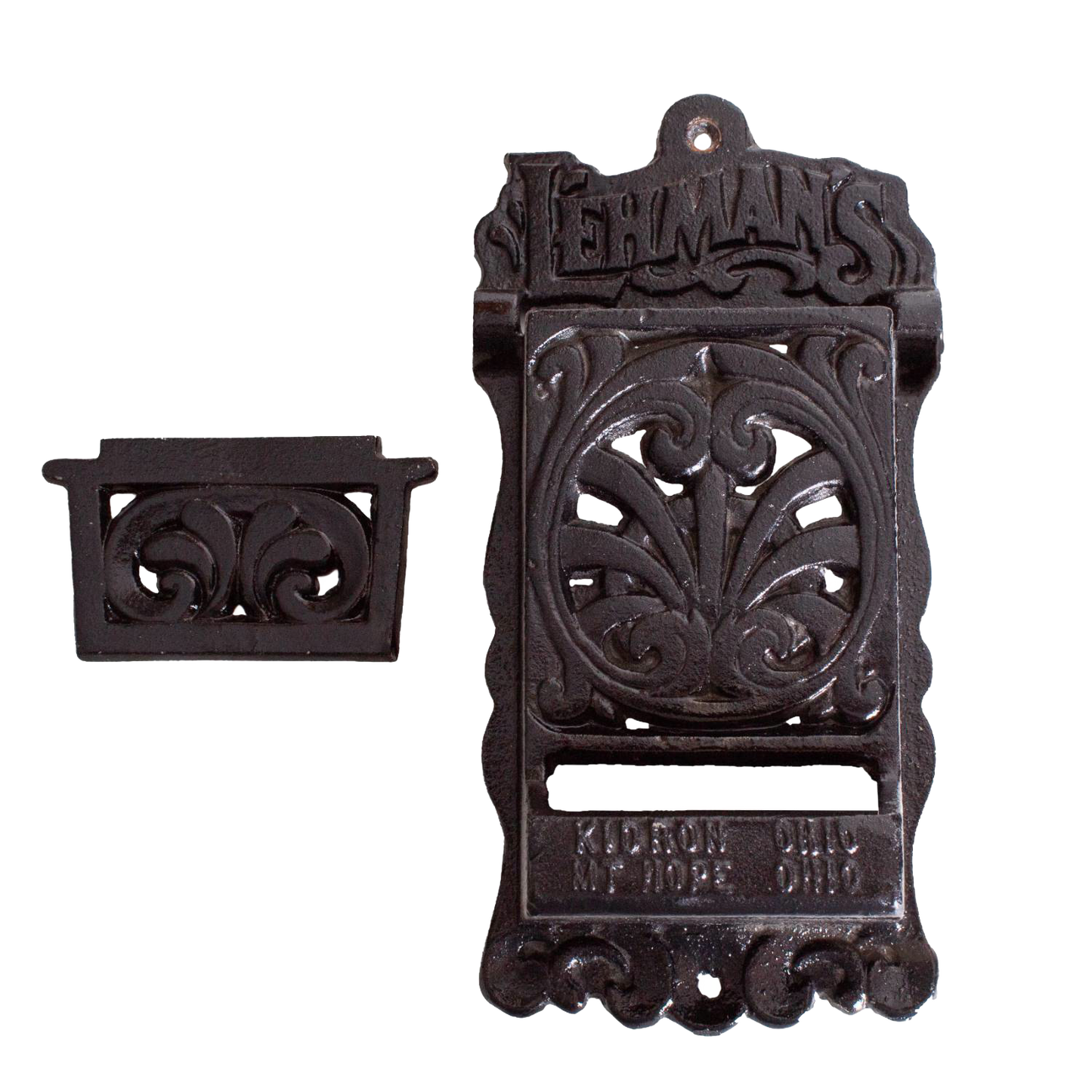 Handcrafted black cast iron wall-mounted matchbox holder with decorative vintage scrollwork and embossed Lehman's branding, Amish made in USA, ideal for Home & Decor and Household Helpers collections.