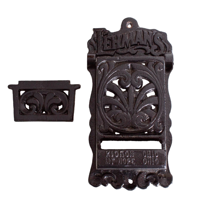 Handcrafted black cast iron wall-mounted matchbox holder with decorative vintage scrollwork and embossed Lehman's branding, Amish made in USA, ideal for Home & Decor and Household Helpers collections.