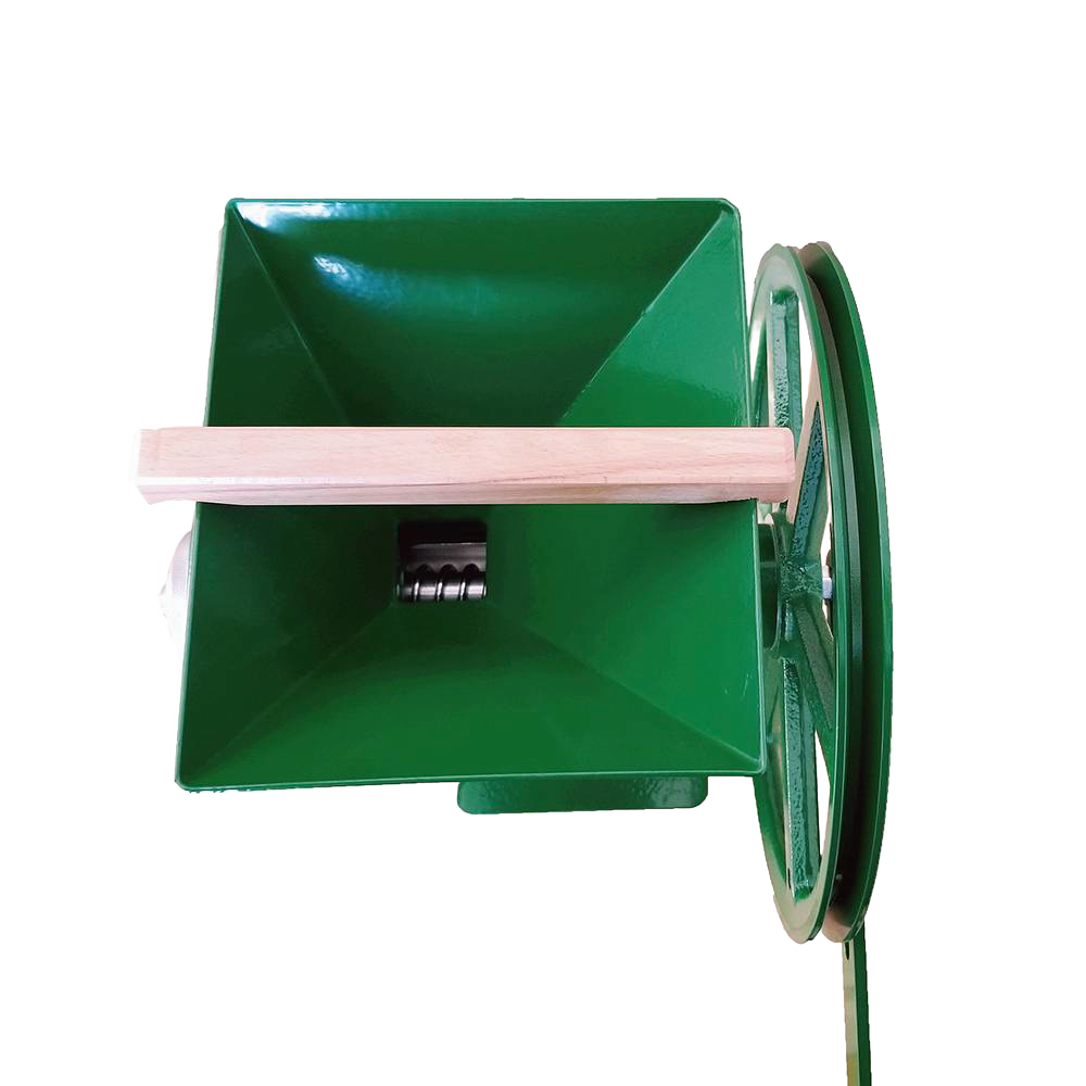 Top view of a handcrafted green milling hopper with a large wooden hand crank attached to a cast iron grinding wheel, designed for homesteading, kitchen, and emergency supplies collections.