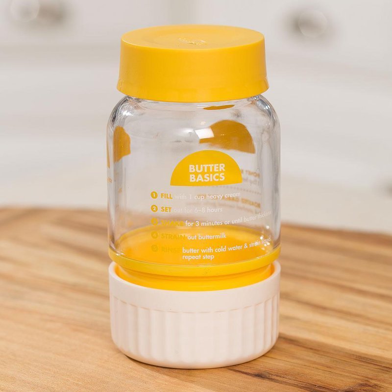 Clear plastic butter maker with yellow lid and white base featuring printed butter-making instructions, ideal for Farm, Garden & Tool, Kitchen & Food, and Making Butter collections.