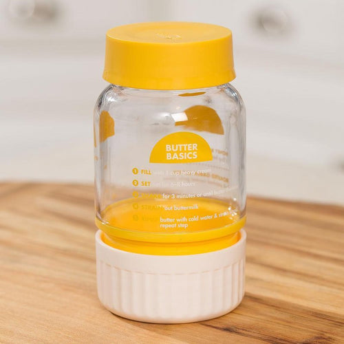 Clear plastic butter maker with yellow lid and white base featuring printed butter-making instructions, ideal for Farm, Garden & Tool, Kitchen & Food, and Making Butter collections.