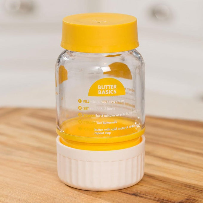 Clear plastic butter maker with yellow lid and white base featuring printed butter-making instructions, ideal for Farm, Garden & Tool, Kitchen & Food, and Making Butter collections.