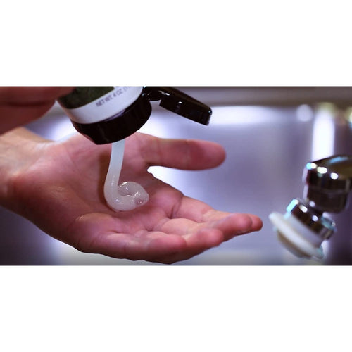 Close-up of a hand receiving a dollop of medicated scrub gel, highlighting its smooth texture for quick relief in Health & Wellness, Health Remedies, USA Made, and Best Sellers collections.