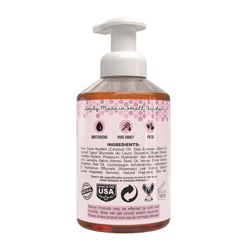 Clear plastic pump bottle of natural foaming hand soap with label listing moisturizing, pure honey, and fresh qualities, made in USA, featured in Health & Wellness and Soaps collections.
