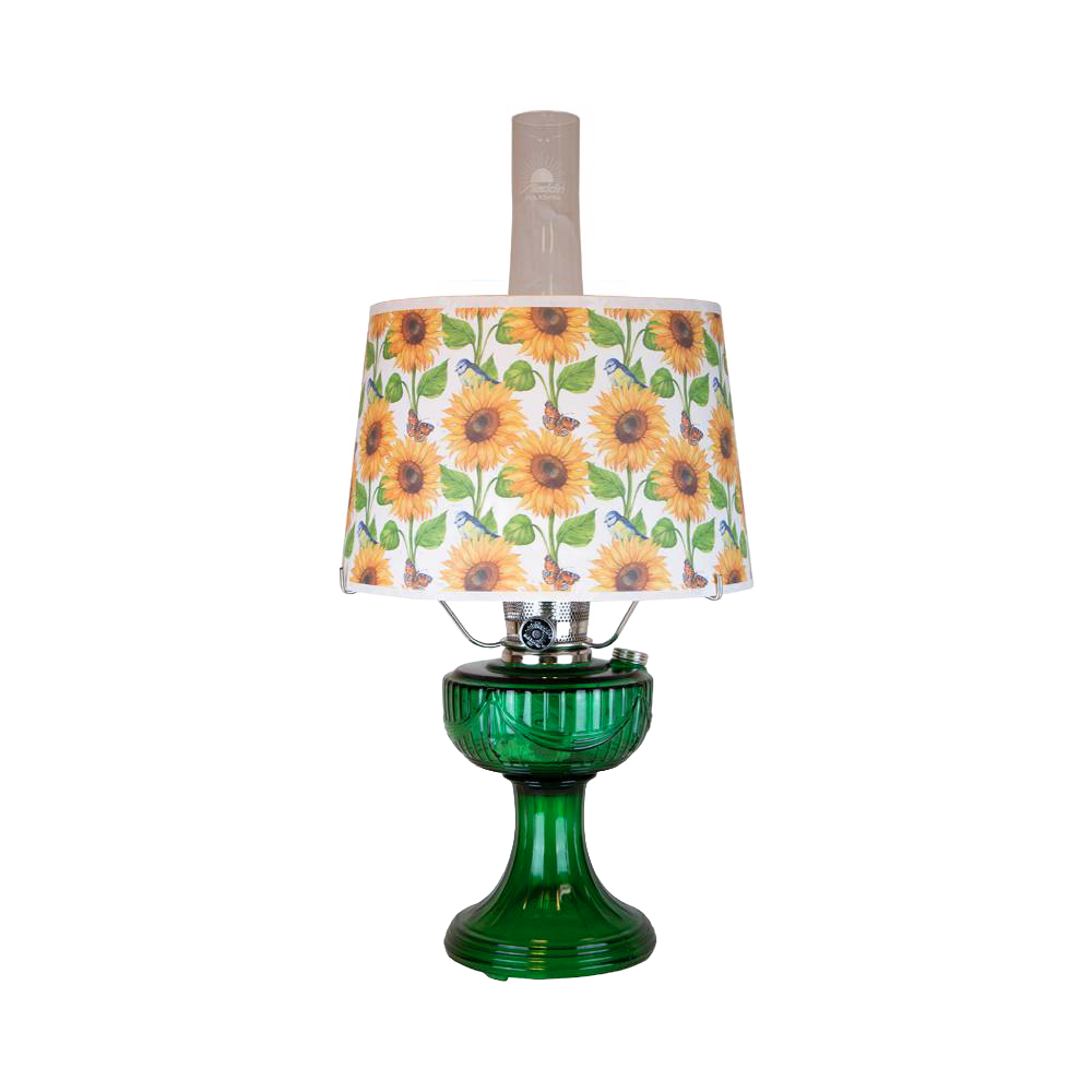 Handcrafted oil lamp featuring an Ohio-made emerald glass base and a shatterproof sunflower-patterned shade, perfect for Farm, Garden & Tool and Lamps & Lighting collections.