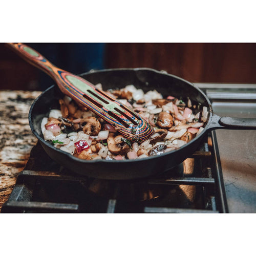 Handcrafted nitrogen-hardened cast iron skillet cooking sautéed mushrooms and onions on stovetop, featured in Kitchen & Food, Cookware, Cast Iron, and Best Sellers collections.