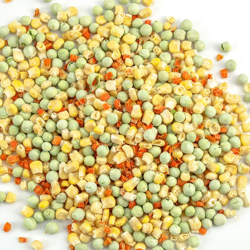 Close-up of a colorful mix of freeze-dried green peas, yellow corn, and orange carrots, highlighting a handcrafted classic vegetable blend made in USA, featured in Kitchen & Food collections.