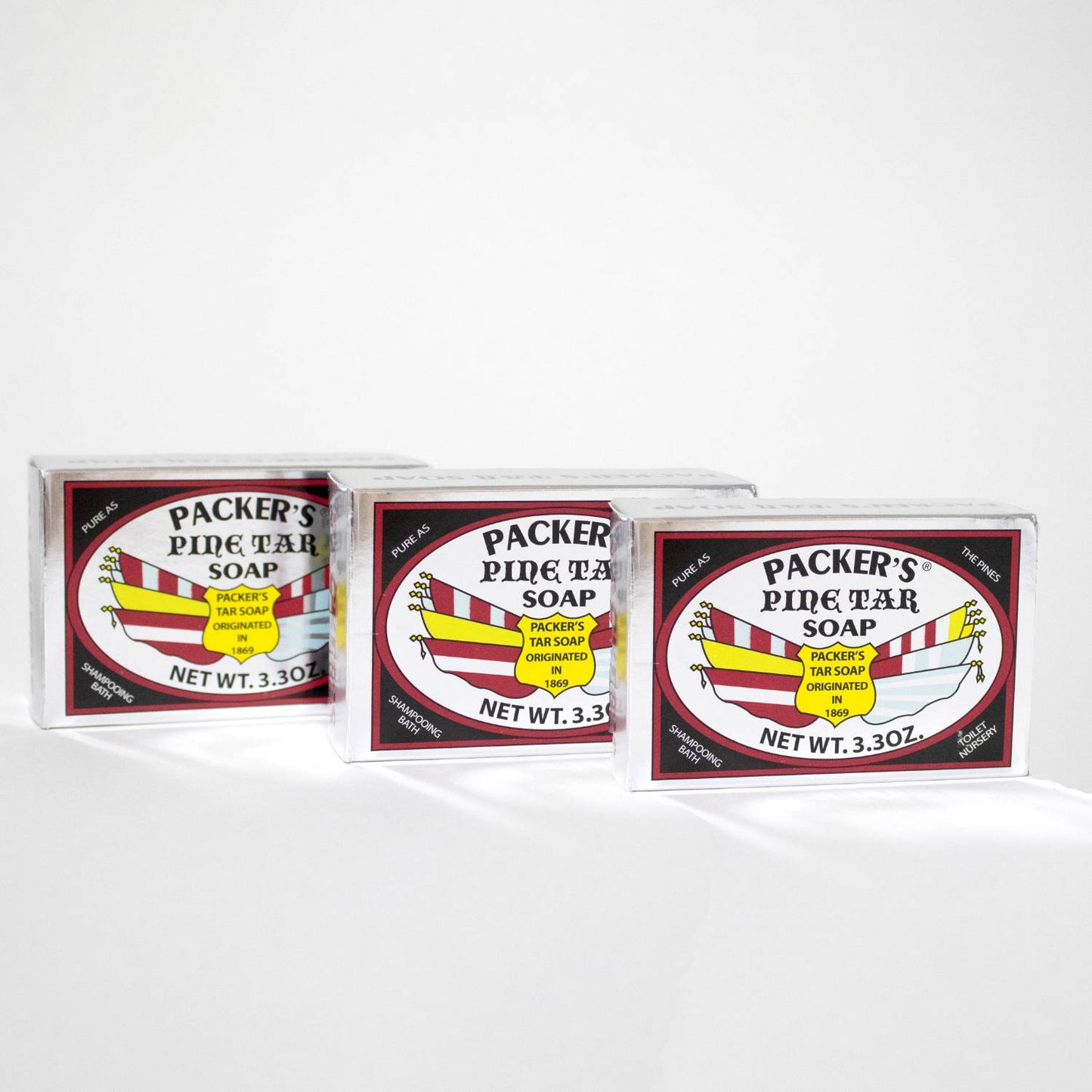 Three-pack of handcrafted Packer's Pine Tar bars, each 3.3 oz, made in USA to help soothe dry and itchy skin, featured in Health & Wellness and Soaps collections.