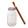 Handcrafted oak jar opener beside a clear mason jar with metal lid, designed for easy seal removal without damaging lids, featured in Kitchen & Food and Canning Accessories collections.