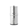 Stainless steel water filtration system with two chambers, featuring black ceramic filter elements, compact design ideal for homesteading and water treatment collections.