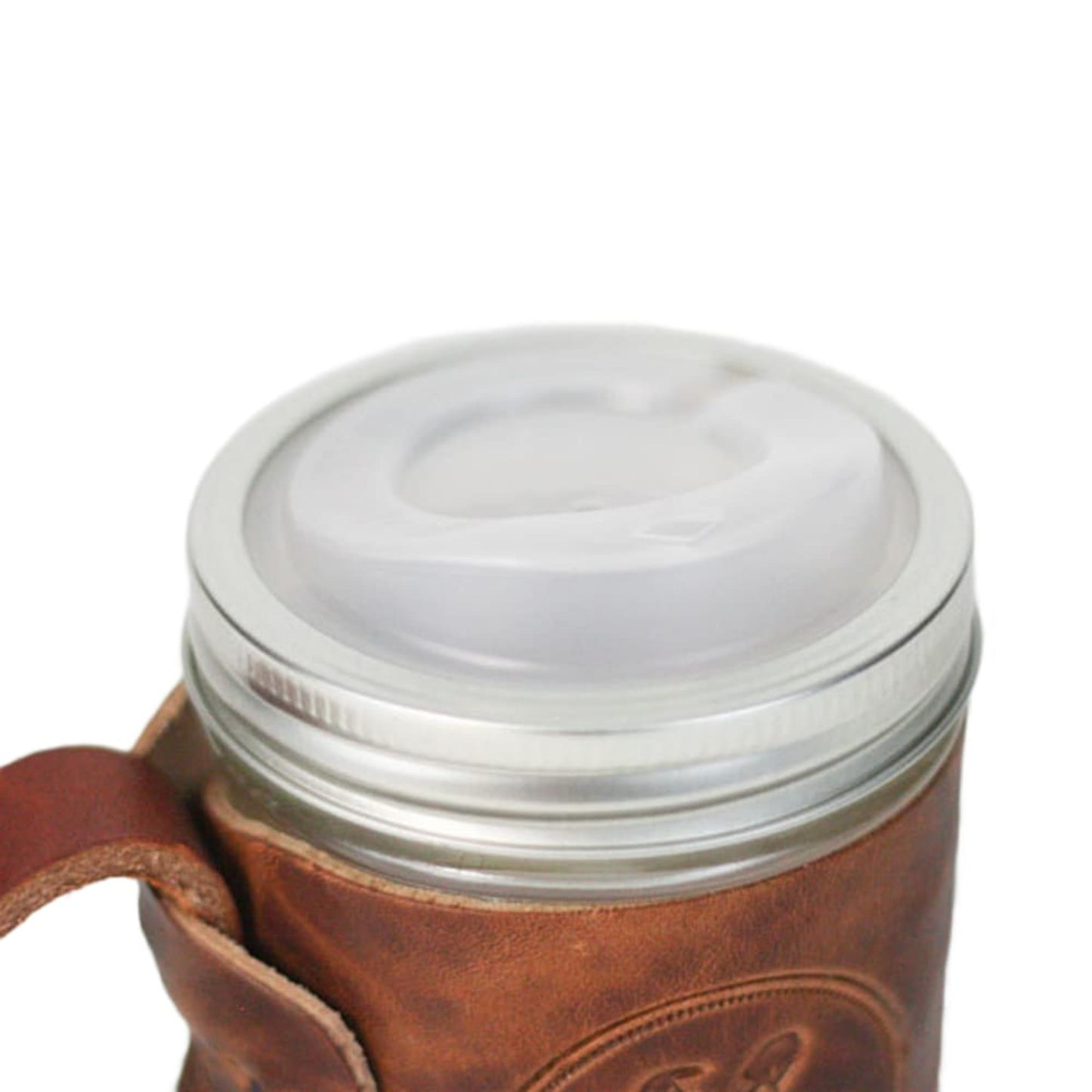 Clear wide-mouth drinking lid securely placed on a glass jar with a brown leather sleeve, part of Kitchen & Food, Dinnerware, Kitchen Gadgets, Kitchen Accessories, USA Made, Best Sellers, and Promo Eligible collections.