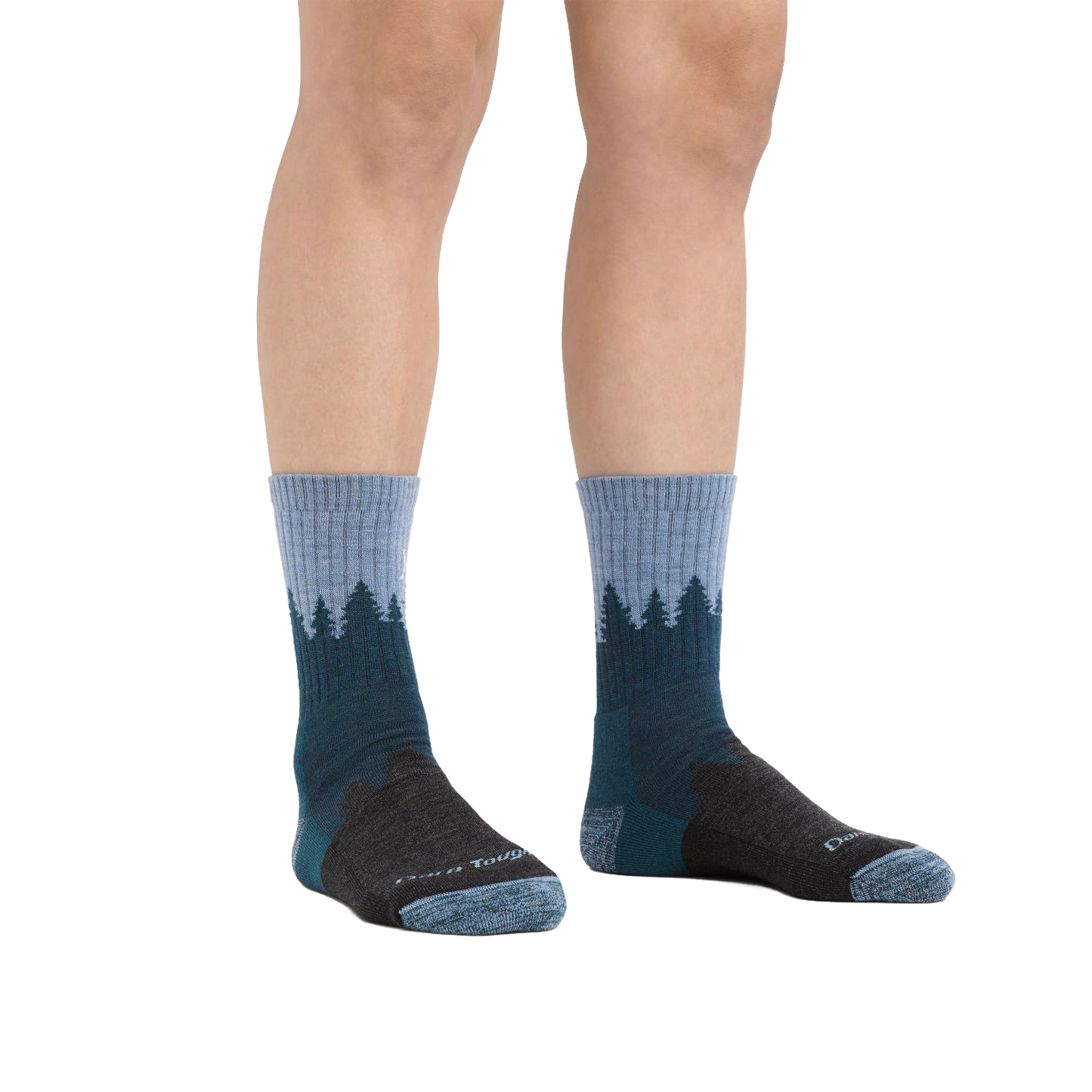 Pair of cushioned crew socks in gray and dark green featuring a treeline pattern, handcrafted in the USA, perfect for camping, health & wellness, and clothing collections.